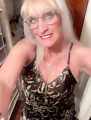 Half-naked explosive mature women posing.