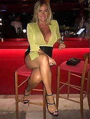 Mature GF is posing seminaked outdoor