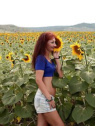 Aged girlfriend is posing undressed on the street