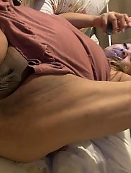 Aroused older woman with red hair on top of a younger man