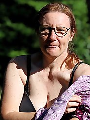 Removing clothes in a forested area of Bad Lauterbach